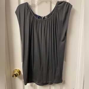 Gray sleeveless top. Tie back.